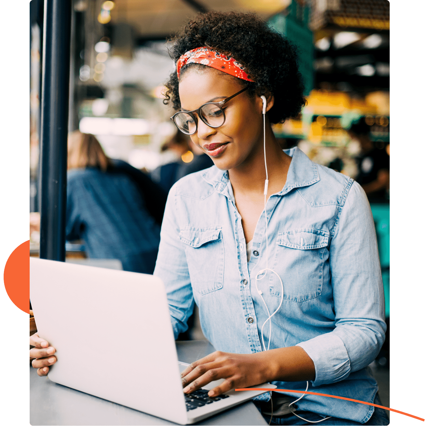 Woman in coffee shop on computer 1